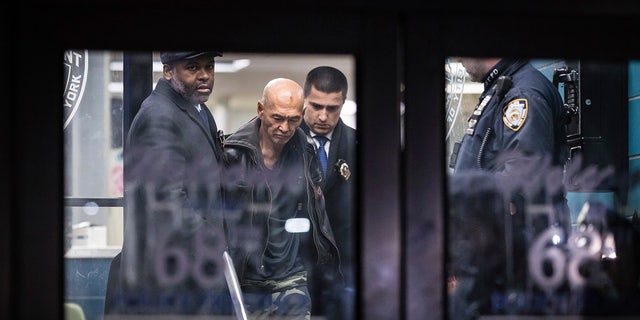 Weng Sor was escorted from a Brooklyn precinct Feb. 14, 2023, a day after allegedly killing one and injuring eight others in a rented U-Haul truck.